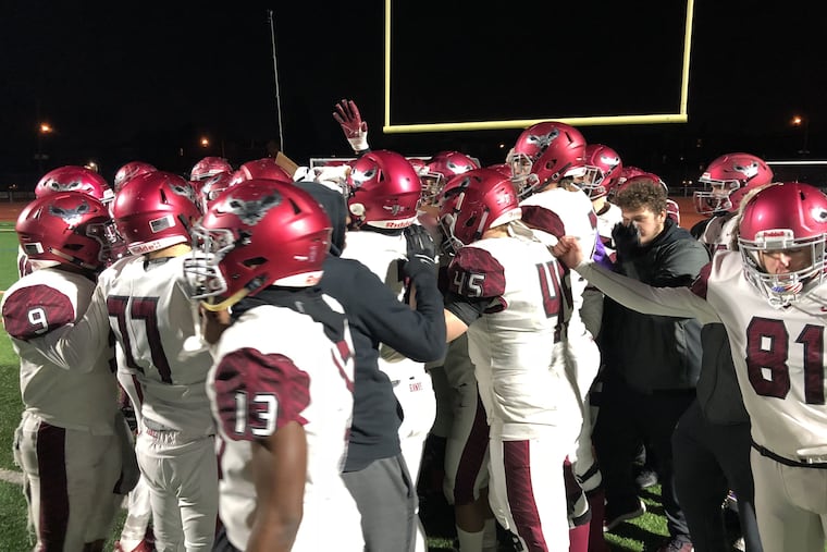 St. Joseph Prep celebrates after defeating Northeast, 49-14, to capture the PIAA District 12 Class 6A title.