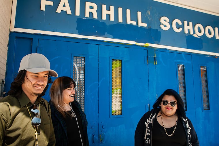 Students (from left) Dante Quinones, Lynoshka Santa, and Chelsey Velez are working on a project to convert artifacts from the closed Fairhill Elementary School into an art installation. MATTHEW HALL / Staff