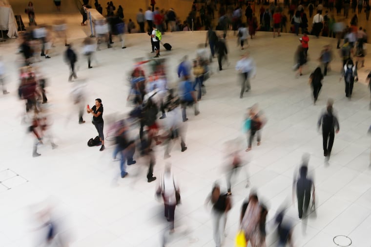 People walk inside the Oculus in New York in 2017.