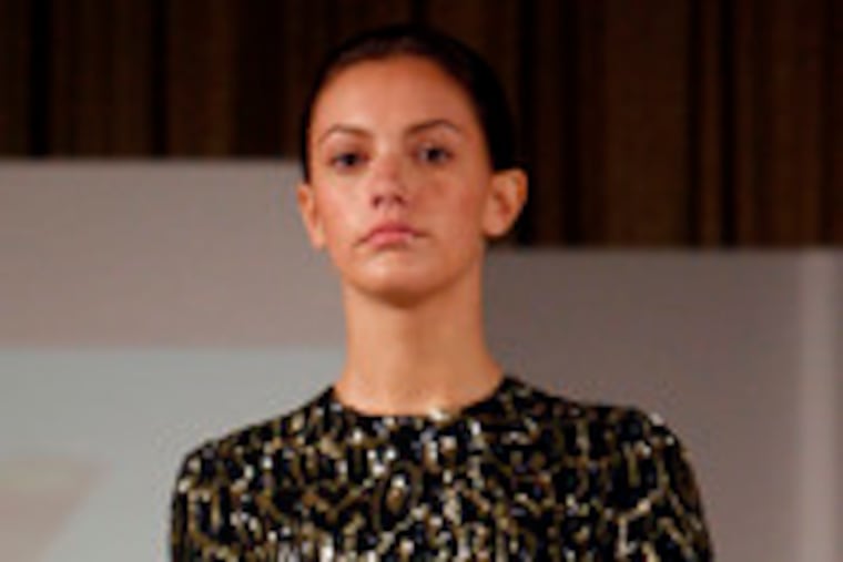 Michael Kors' cap-sleeve dress with black/gold cheetah paillettes. He was the featured designer at the 51st annual Daisy Day event.