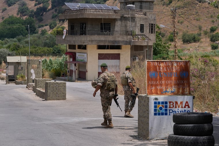 Lebanese army soldiers stand at a checkpoint in Froun village, southern Lebanon, Thursday, July 16, 2026.