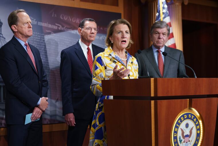 In this photo taken May 27, Sen. Shelley Moore Capito, R-W.Va., the GOP's lead negotiator on a counteroffer to President Joe Biden's infrastructure plan, speaks at a news conference as she is joined by, from left, Sen. Pat Toomey, R-Pa., Sen. John Barrasso, R-Wyo., chairman of the Senate Republican Conference, and Sen. Roy Blunt, R-Mo., at the Capitol in Washington.