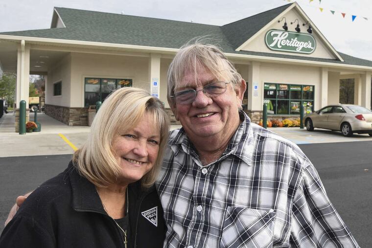 Harold “Skeeter” Heritage, 68, President of Heritage’s Dairy Stores, and his wife Pat, VP of Heritage’s Dairy Stores, outside their newest location, the 33rd store in the chain, on Grove Road in Thorofare, NJ on November 14, 2017. They have been married 27 years.
