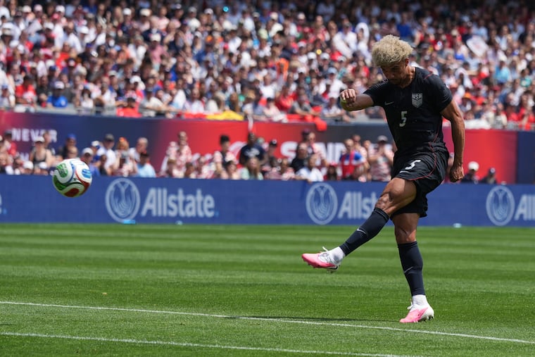 United States defender Antonee Robinson scored his team's goal against Germany on Saturday in Chicago.