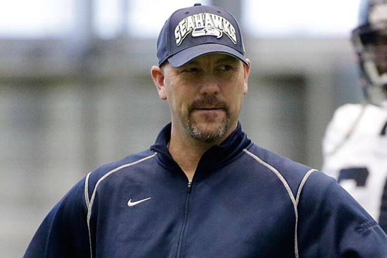 The Eagles will fly Seahawks defensive coordinator Gus Bradley to Philadelphia for a second interview on Tuesday.(Ted S. Warren/AP file photo)