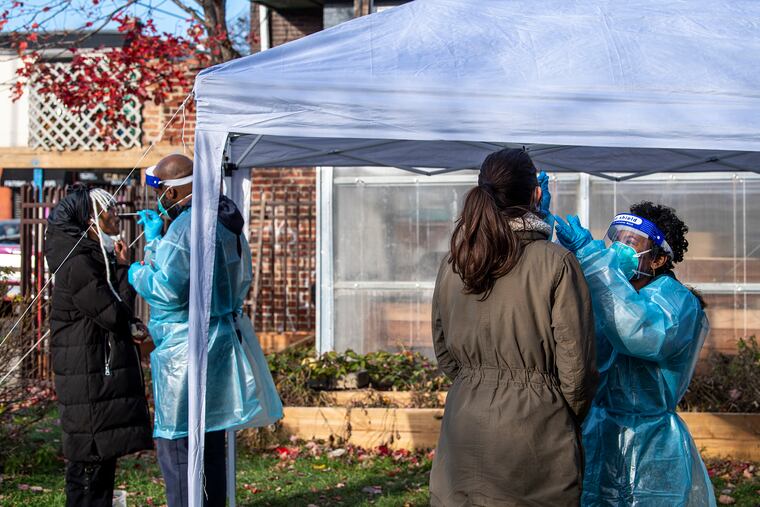 Patients are tested for the coronavirus at a Philadelphia FIGHT testing site in Kensington.