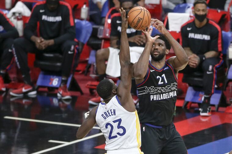 Draymond Green was a pest on defense, helping contain Joel Embiid. He also had two steals.