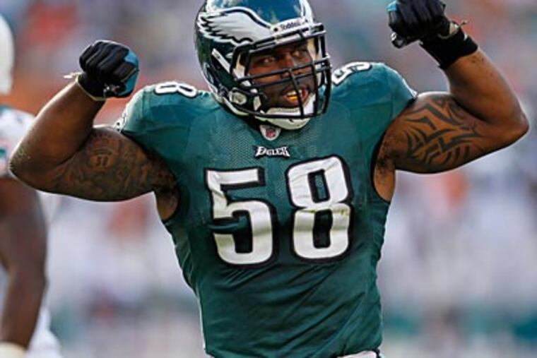 Eagles defensive end Trent Cole finished Sunday's game against the Dolphins with three sacks. (Ron Cortes/Staff Photographer)