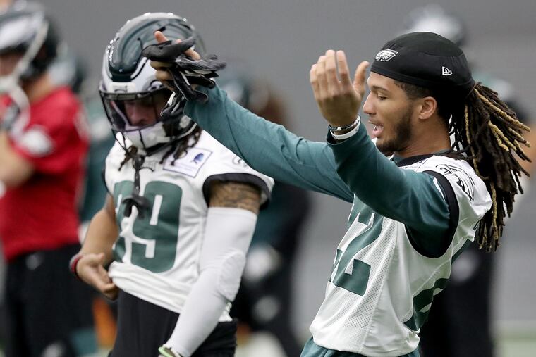 Eagles cornerback Sidney Jones dances as he warms up during Eagles practice at the NovaCare Complex on Thursday. He is expected to play a lot Sunday against the Giants.