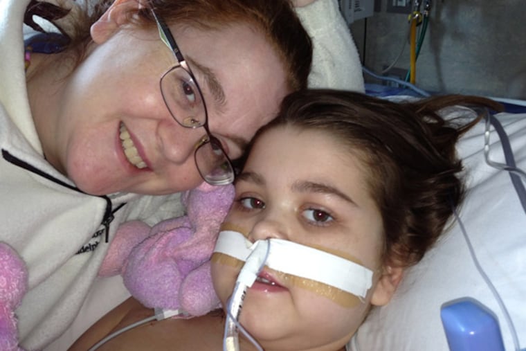 Sarah Murnaghan, 10, with her mother, Janet, on Friday at Children's Hospital of Philadelphia.