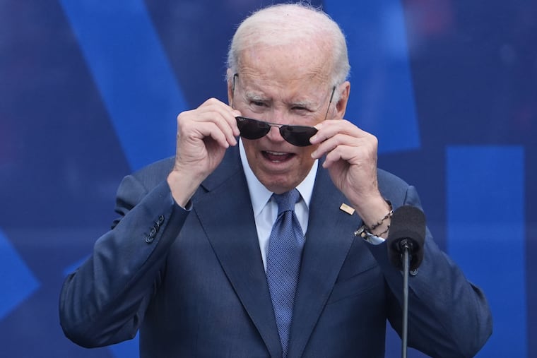 Former President Joe Biden looks out at the crowd during the dedication ceremony for the Obama Presidential Center, June 18, 2026, in Chicago.