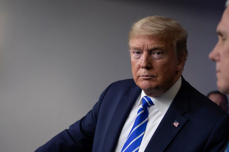 President Donald Trump pauses while speaking about the coronavirus on Thursday.