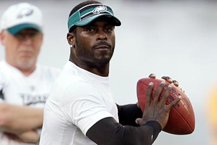 Michael Vick recently signed a $100 million contract with the Eagles, with $40 million guaranteed. (David Maialetti/Staff Photographer)