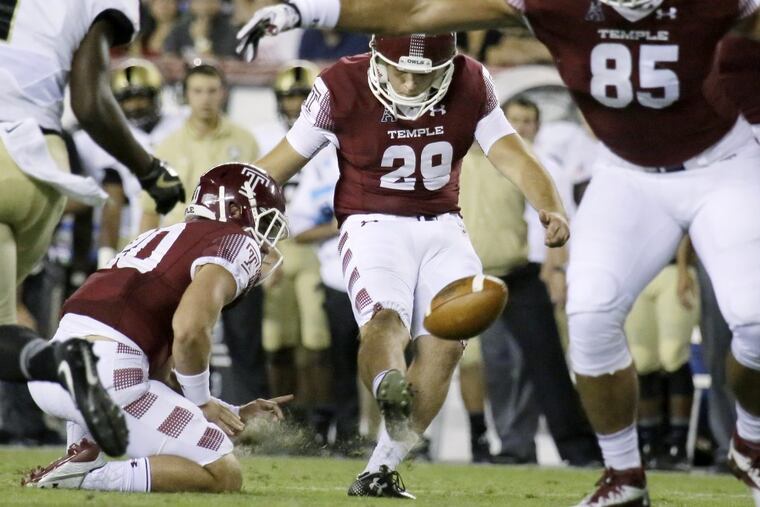 Austin Jones kicks a field goal last September against Army, before an injury ended his season.