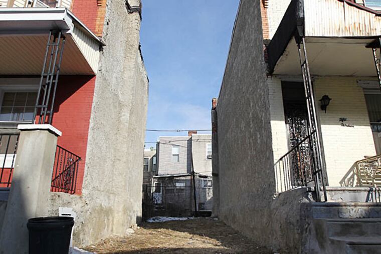 The city's property tax system is still a mess.. ( DAVID MAIALETTI / Staff Photographer )