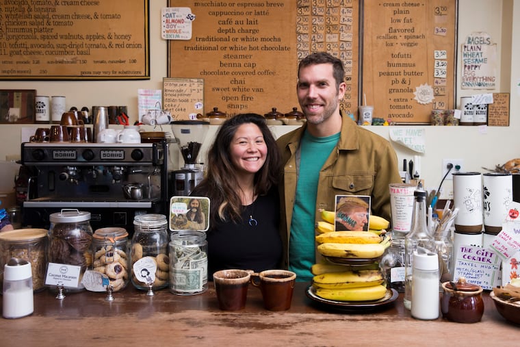 Crystal Stokowski met her husband, Davidson Thomas, after Benna's Cafe owner Nancy Trachtenberg set her mind to getting them together. Stokowski (and Thomas) worked at Benna's for several years; she created the signs seen behind her in this photo.