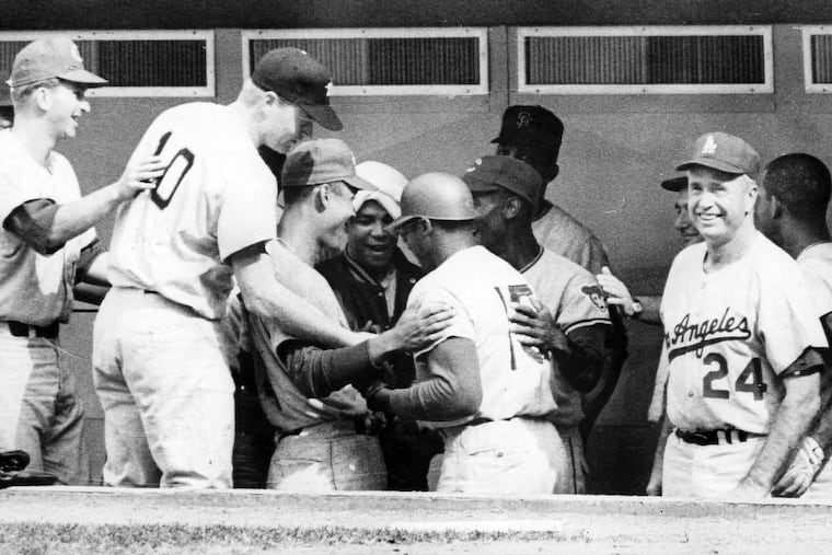 National League All-Stars congratulate the Phillies’ Dick Allen after his second-inning home run in 1967.