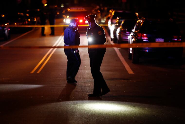 Philadelphia Police investigate a scene.