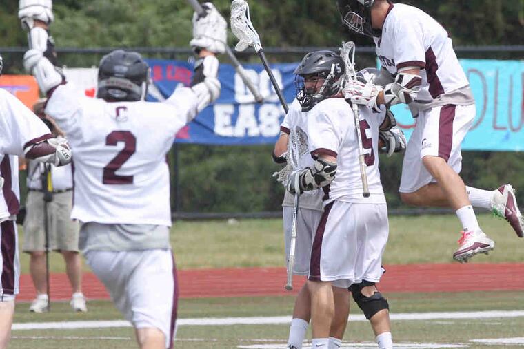 Conestoga celebrates a second-quarter goal against Central Bucks East that gave it a 9-0 lead in the state semifinal. The top-ranked Pioneers are outscoring foes by 11.3 goals in the tourney.