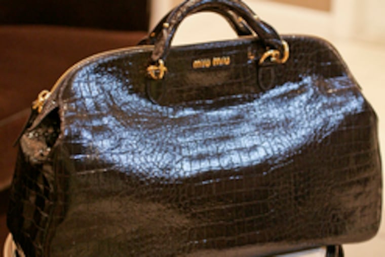 Miu Miu's animal skin bag goes for $1,095.