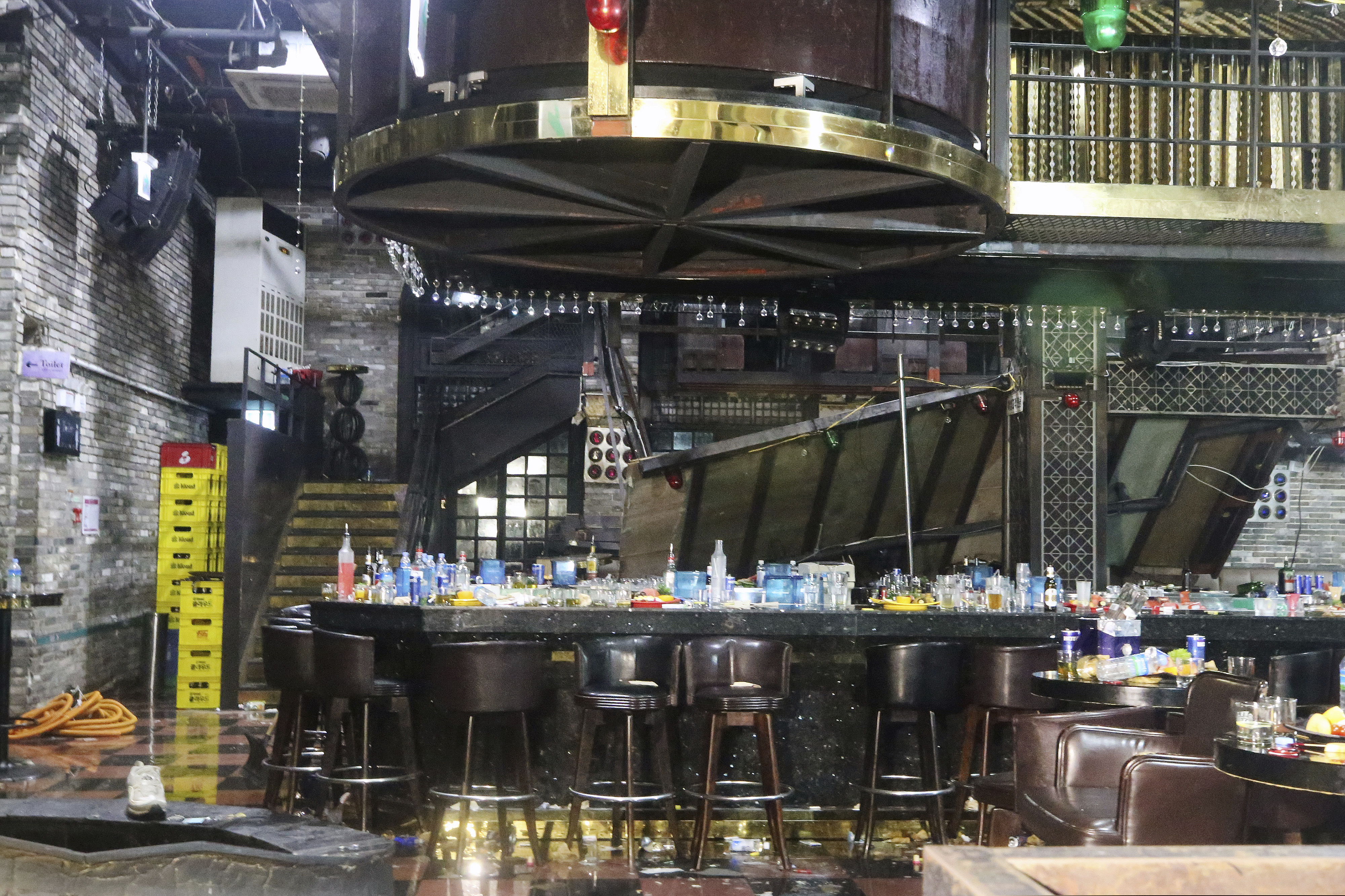 A collapsed internal balcony is seen at a nightclub in Gwangju, South Korea, Saturday, July 27, 2019. Members of the U.S. national water polo team were in a South Korean nightclub on Saturday when an internal balcony collapsed, killing at least one person.