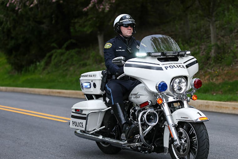 Officer Daniel McFarland on a new Tredyffrin Township Police motorcycle on Monday, May 5, 2014. ( Steven M. Falk / Staff Photographer )