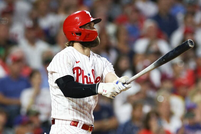 Bryce Harper hits a two-run homer for the Phillies in the fourth inning against the Los Angeles Angels.