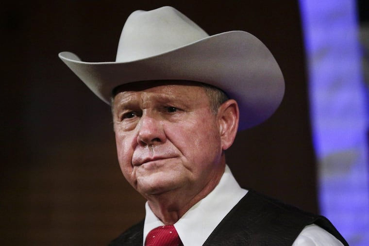 Former Alabama Chief Justice and U.S. Senate candidate Roy Moore speaks at a rally in September. He’s had no campaign events for several days.
