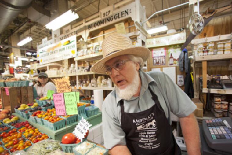 Benuel Kauffman has been selling his vegetables, fruits, and homemade jams and jellies at the market since 1979. (David M. Warren / Staff Photographer)