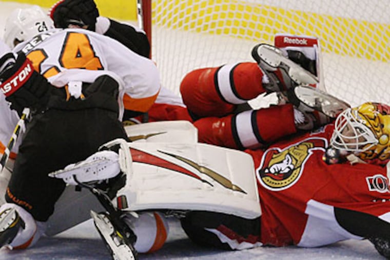 Matt Read (left), Sean Couturier and Harry Zolnierczyk combined for seven points against Ottawa. (Fred Chartrand/Canadian Press/AP)