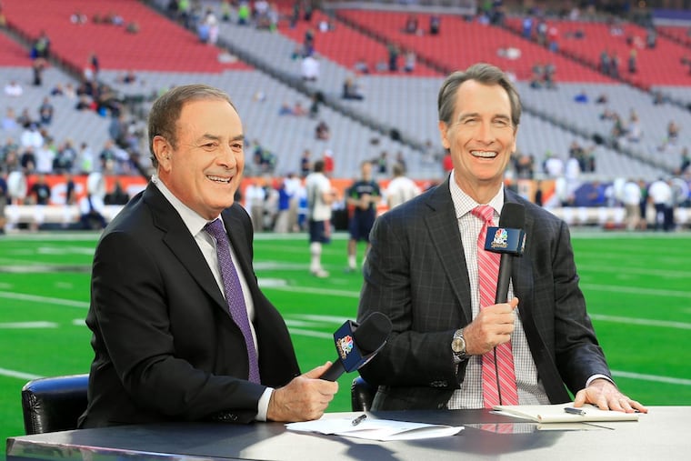 NBC’s Al Michaels (left) with longtime broadcast partner Cris Collinsworth. Super Bowl LVI will likely be Michaels' final broadcast as NBC's top announcer, and he is expected to join Amazon to call "Thursday Night Football" games.