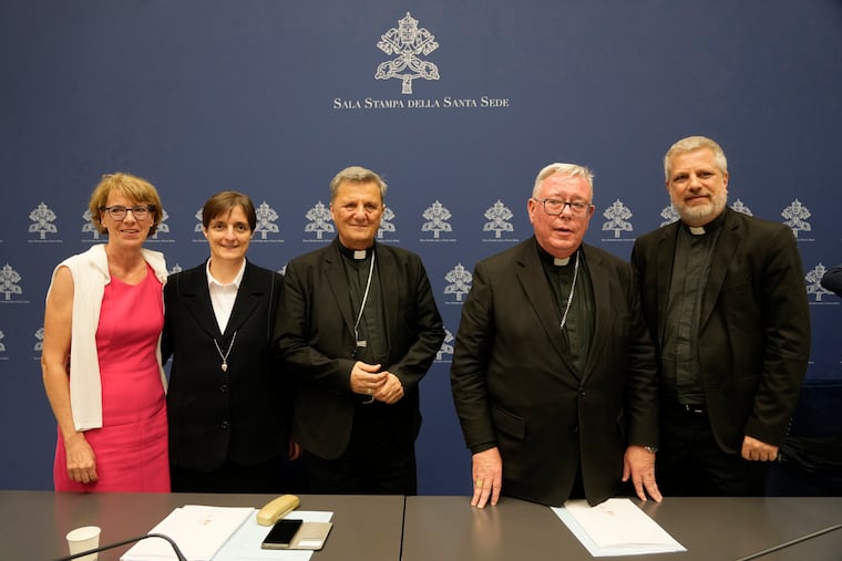 From left: Helena Jeppesen Spuhler, Sister Nadia Coppa, Secretary General of the Synod of Bishops Cardinal Mario Grech, Cardinal Jean-Claude Hollerich, and Father Giacomo Costa at a presentation of the new guidelines for the Synod of Bishops at the Vatican.