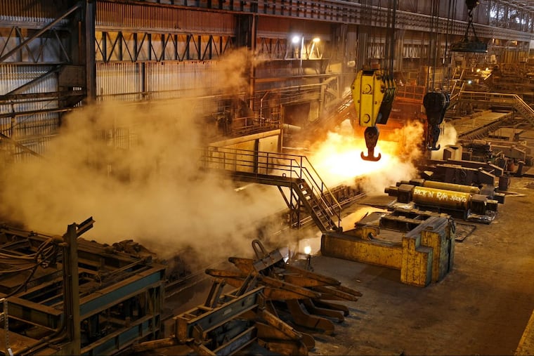ArcelorMittal steel plant in Conshohocken, Pa. in 2010. Phoenix Services, a Kennett Square firm that handles slag and slap for steelmakers including ArcelorMittal, has been sold to Sixers owner Josh Harris investment firm, Apollo Global