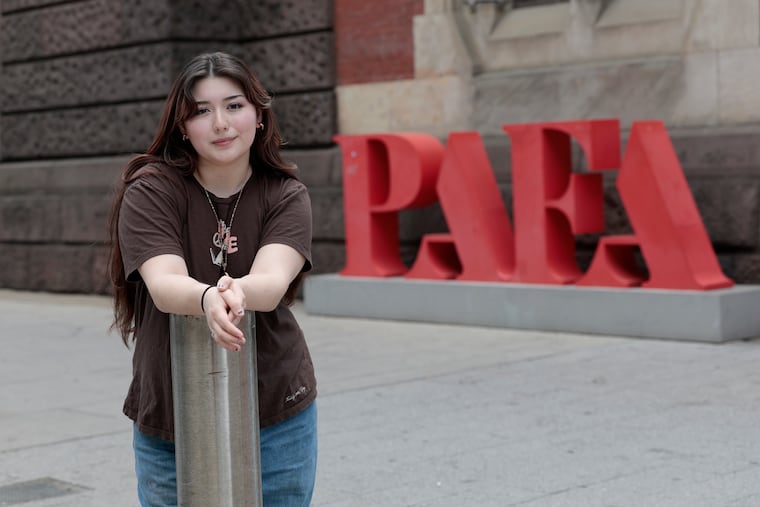 Faith Castillo of Philadelphia is a member of the last Pennsylvania Academy of the Fine Arts class to graduate with a college degree. Faith was photographed in front of the Pennsylvania Academy of the Fine Arts' Furness building in Philadelphia on Friday, May 2, 2025.