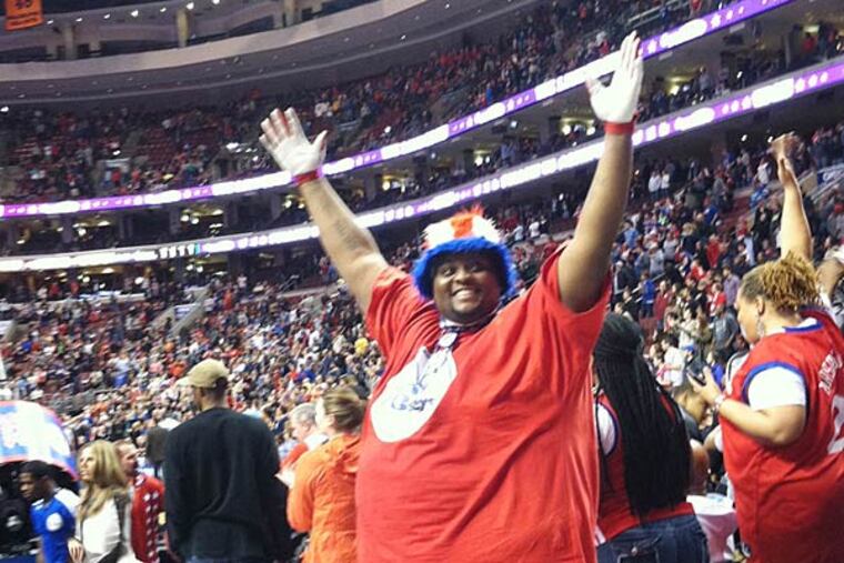 James "Big Daddy" Brister celebrates the 76ers first win after a 26-game losing streak. The Sixers' 123-98 thrashing of the Detroit Pistons avoided a 27th consecutive loss which would have been the longest losing streak in major pro sports history. (Photo by Dan Geringer/Daily News staffer)