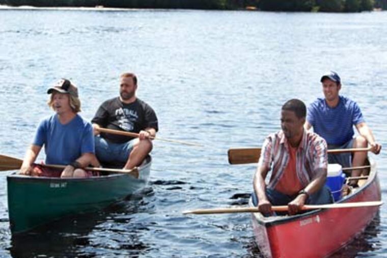 In this film publicity image released by Columbia Pictures, from left, David Spade, Kevin James, Chris Rock and Adam Sandler are shown in a scene from "Grown Ups." (AP Photo/Columbia Pictures-Sony, Tracy Bennett)