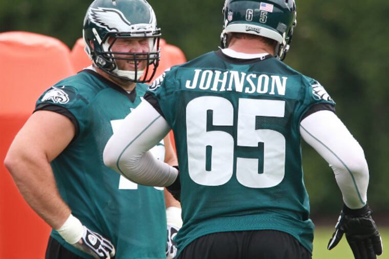 Eagles offensive linemen Allen Barbre and Lane Johnson. (Michael Bryant/Staff Photographer)