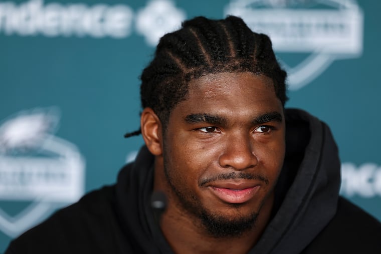 Eagles linebacker Jihaad Campbell speaks with reporters during training camp at the Jefferson Health Training Complex on Thursday.