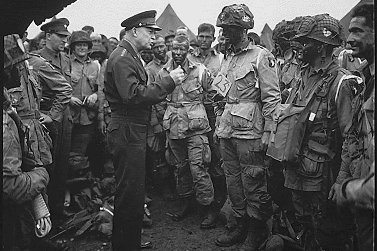 Gen. Dwight D. Eisenhower meets with U.S. Army paratroopers in England, before the Normandy invasion on June 5, 1944.
