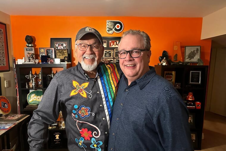 Reggie Leach (left), shown with filmmaker Joe Amodei, scored the first goal in the Flyers' 4-1 victory over the Soviets.
