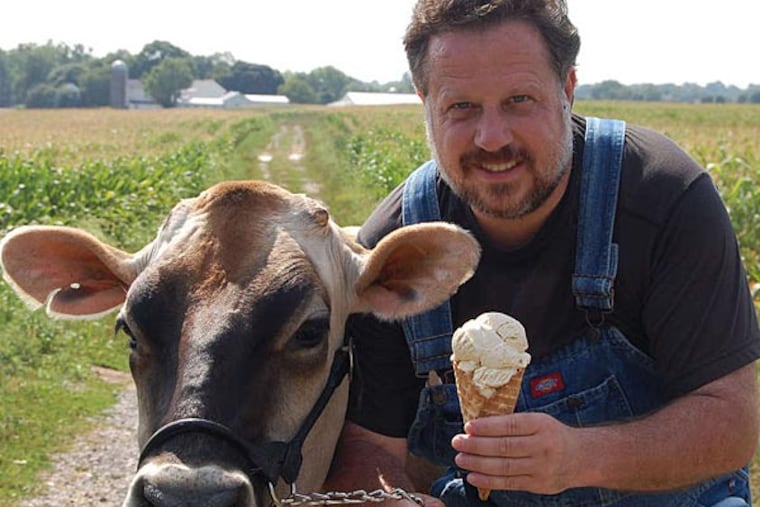 "Uncle Dave" Adami with a cone and the source of some of it at Shady Brook Farm.
