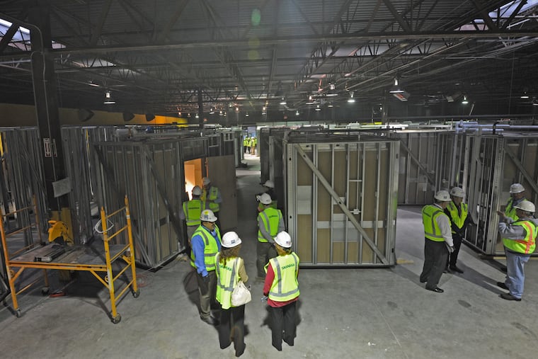 Visitors to a temporary Skanska USA Building facility in New Castle, Del., in 2013 viewed prefab modular construction for the Nemours/A.I. duPont Hospital for Children. These workshop assembly techniques, novel when that project was built, are now a regular part of construction, says Todd Lofgren, head of Skanska's Philadelphia region.
