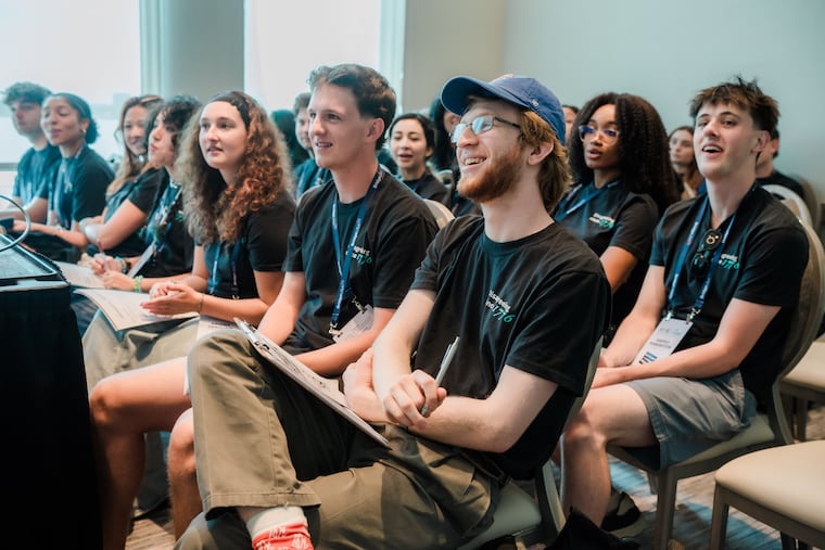 A group of college students listens to a presentation during the 2026 BridgeUSA Annual Summit in Philadelphia. The group seeks to empower young people to engage in constructive dialogue and disagreement.