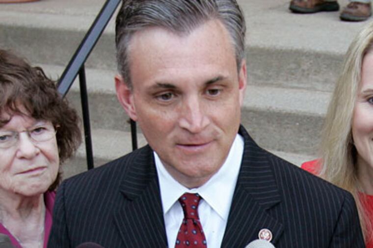 Democratic U.S. Senate candidate and New Jersey Rep. Robert Andrews, D-Camden, listens to a question as he stands with his wife, Camille Andrews and daughters Jacquelyn, 15, right, and Josie 13, second right, in Haddon Heights, N.J., after voting Tuesday, June 3, 2008 in the primary election where he is challenging incumbent Sen. Frank Lautenberg in the Democratic race. Andrews' challenge of Lautenberg has been a contentious Democratic primary in which Lautenberg's age of 84 and Andrews' initial support of the Iraq war have been issues. At left is Andrews mother-in-law, Phyllis Wolf. (AP Photo/Mel Evans)