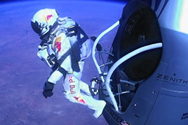 This image provided by Red Bull Stratos shows pilot Felix Baumgartner of Austria as he jumps out of the capsule during the final manned flight for Red Bull Stratos on Sunday, Oct. 14, 2012. In a giant leap from more than 24 miles up, Baumgartner shattered the sound barrier Sunday while making the highest jump ever — a tumbling, death-defying plunge from a balloon to a safe landing in the New Mexico desert. (AP Photo/Red Bull Stratos)
