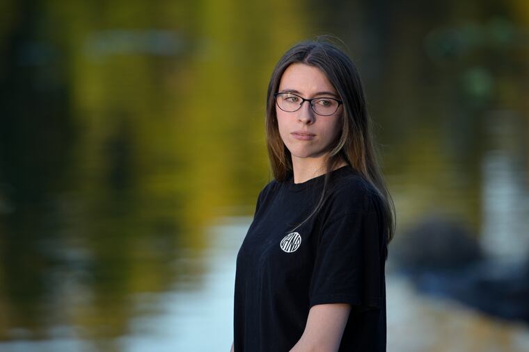 Alyssa Burns, 24, is photographed at a park in Orlando, Fla.