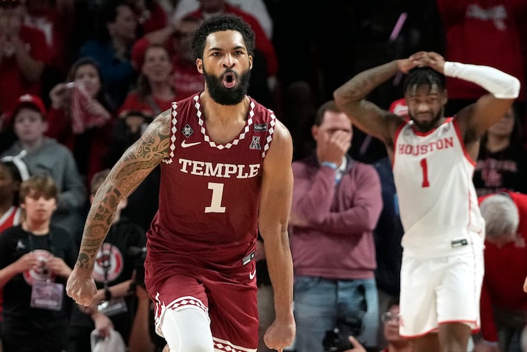 Temple's Damian Dunn celebrates as Houston's Jamal Shead (right) reacts at the end of Sunday's upset in Houston.