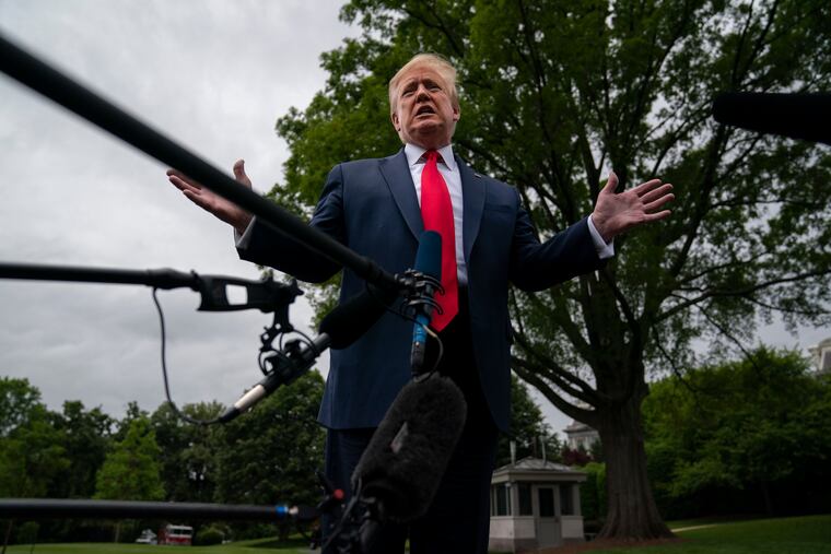 President Donald Trump talked to reporters before departing the White House for a trip to Michigan on Thursday.