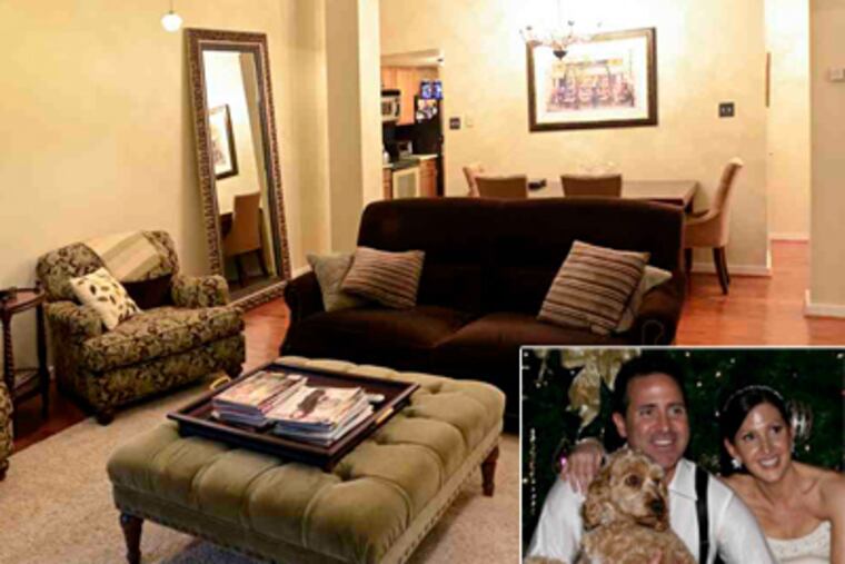 Melissa Webb bought her condo at the height of the boom market in 2006. She's selling now to get more room for her new husband, Rick, and his cockapoo. (Jim Swanson / Staff Photographer)