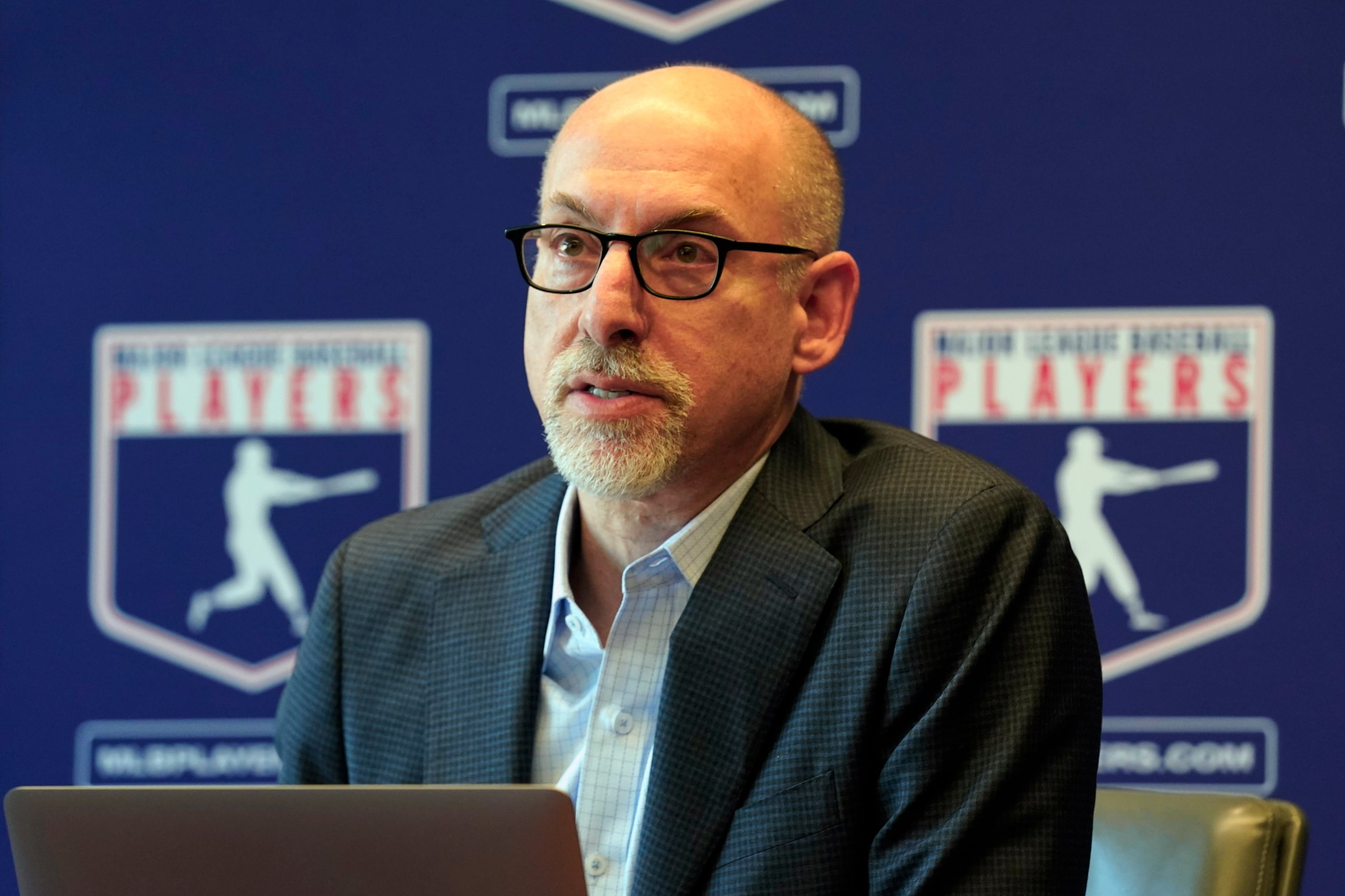 Baseball players' union vows to block MLB salary cap, citing unbroken contract history